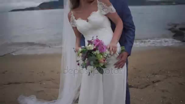 Just married couple with a bouquet — Stock Video