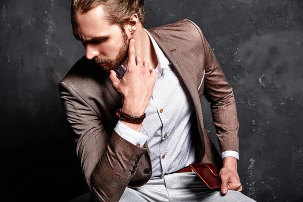 Male model dressed in brown suit — Stock Photo, Image