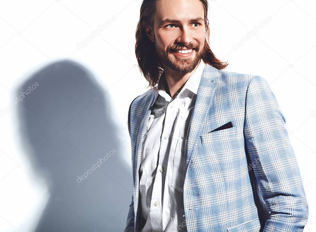 portrait of handsome fashion stylish hipster businessman model dressed in elegant light blue suit  isolated on white