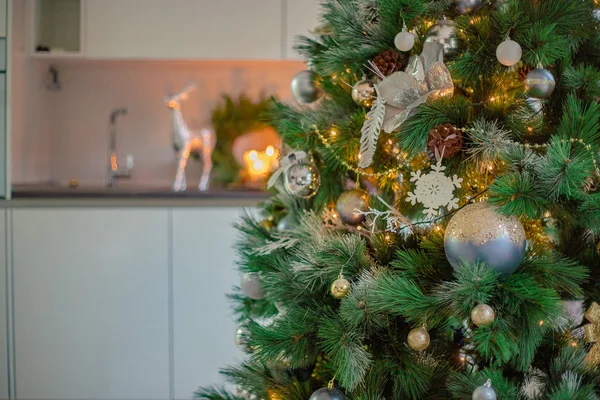 Christmas lights hanging in a tree — Stock Photo, Image