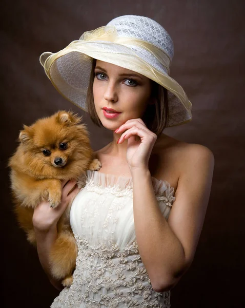 Woman with yellow dog