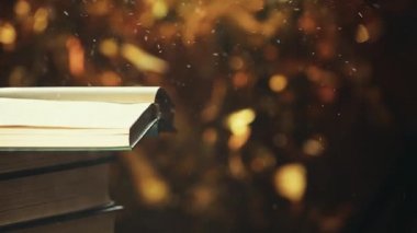 Kitap rüzgar tozu altın bokeh hd video 