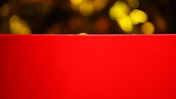 Червона Коробка Вітру Золотий Боке Кадри — стокове відео