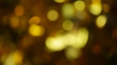 Altın top bokeh rüzgar koyu arkaplan HD görüntüleri 