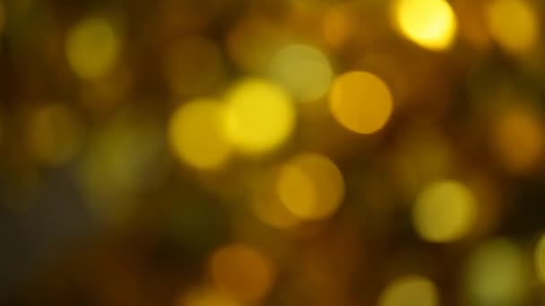 Gold Ball Bokeh Wind Dark Background Footage — Stock Video