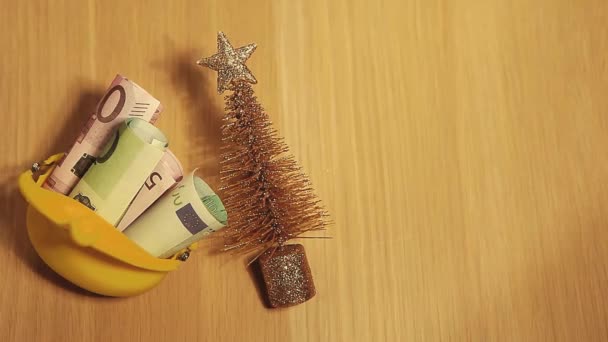 金モミの木の財布お金テーブルHd映像 — ストック動画