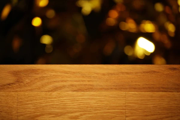 Scrivania Legno Oro Bokeh Sfondo Scuro — Foto Stock