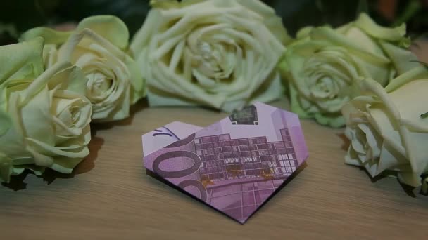 Деньги Розовый Цветок Стол Фон Кадров — стоковое видео