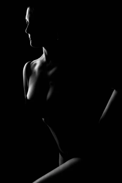 Cuerpo femenino blanco y negro en la fotografía de arte de luz de fondo —  Fotos de Stock