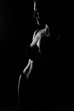 siyah ve beyaz kadın vücudu arka planda sanat fotoğrafçılığında.
