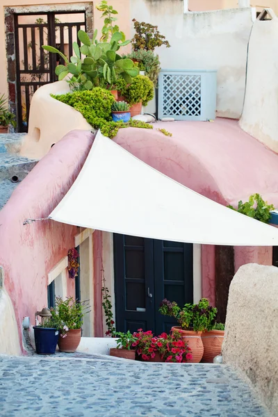 ギリシャ サントリーニ島、ギリシャ イアの町の建物します。篠笛 — ストック写真