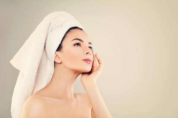 Spa Model Woman with Healthy Skin and White Towel after Bath