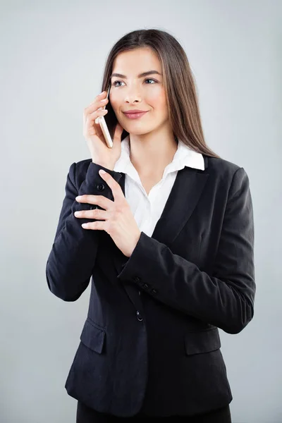 Businesswoman with Cellphone. Executive Wearing Suit Smiling — Stock Photo, Image