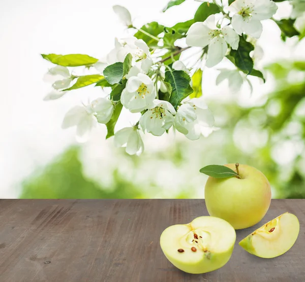 Organic Apple Fruits on Gray Wood Texture