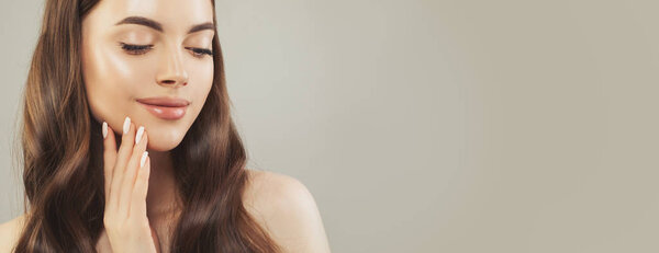 Close up face of beautiful woman with clear skin 