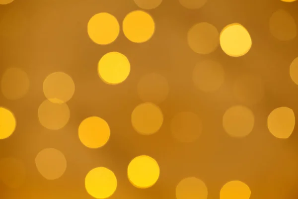 Altın bokeh ışık soyut arkaplan, çözülmüş simli süslemeler — Stok fotoğraf