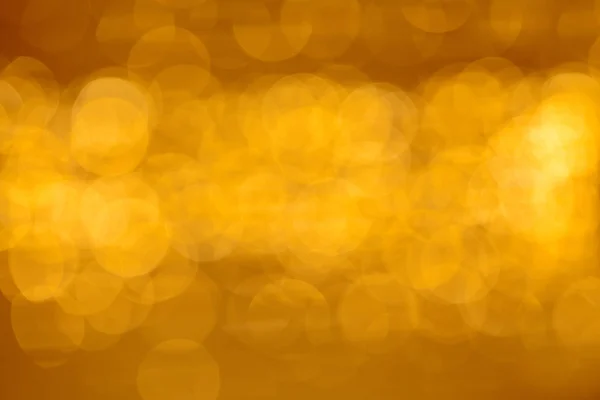 Rich golden bokeh background glitter — Stockfoto