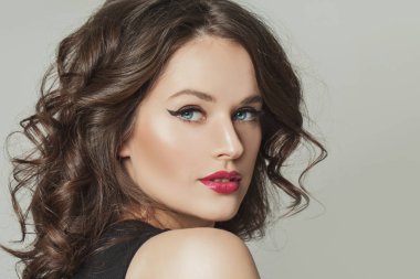 Nice brunette woman face close up