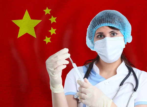 Scientist woman with vaccine for Covid-19 against China flag. Research of viruses in laboratory for prevention of a pandemic in Wuhan China