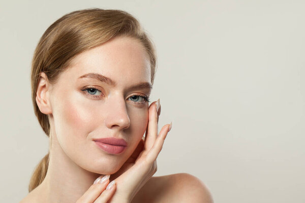 Elegant perfect model woman with clear skin on white