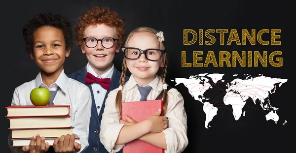 Distance education and learning concept. Happy smiling kids on blackboard background
