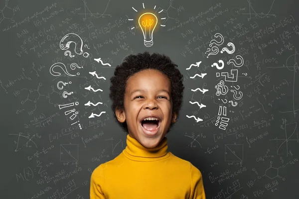 Smart Black Kid Student Lightbulb Blackboard Background Brainstorming Idea Concept — Stock Photo, Image