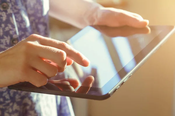 Hands holding digital tablet pc and touching with finger — Stock Photo, Image