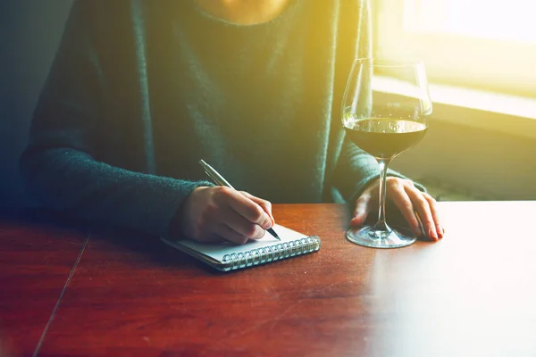 Hands writing on notebook — Stock Photo, Image