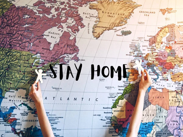 Hands Holding Wooden Little Men Map Background Text Stay Home — Stock Photo, Image