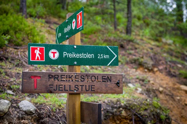 Hiking path touristic road sign to famous Prekestolen rock.