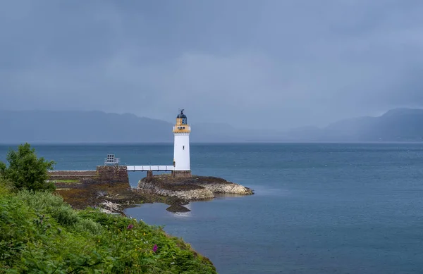 Nothern sea at cloudy weather and Tobermory Lighthouse — Stock Fotó