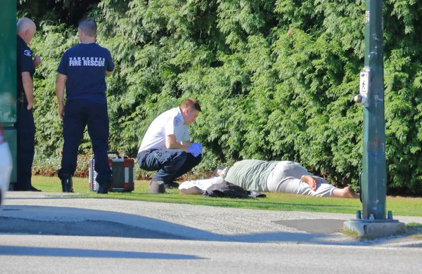 Homem em colapso em Vancouver Street — Fotografia de Stock
