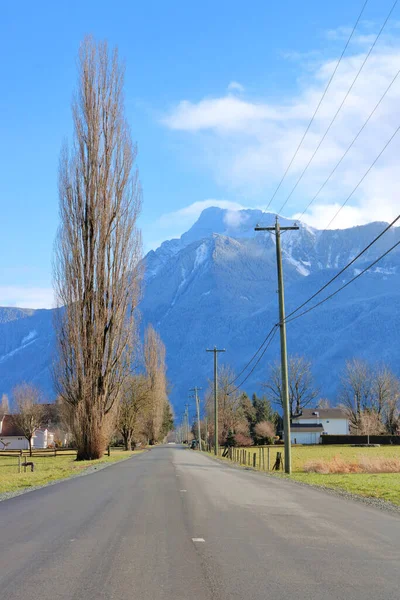 Vertical View Narrow Two Lane Country Road Leading Beautiful Snow — Stock Photo, Image