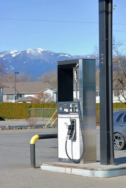 Vertical View Gas Station Pump Snow Capped Mountains Background — Stock Photo, Image