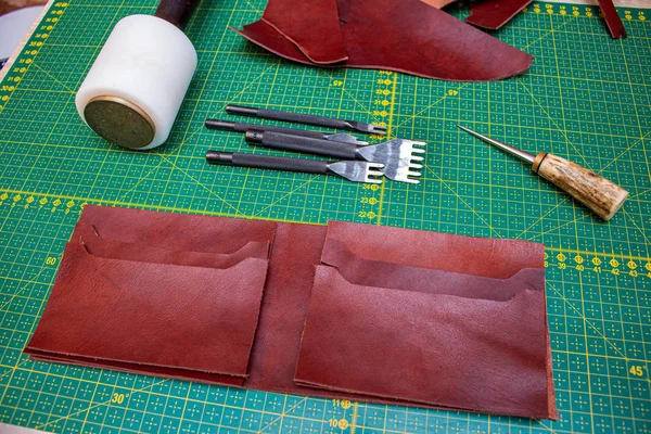 Creating sewing leather handmade wallet leathercraft. Pattern, tools, leather