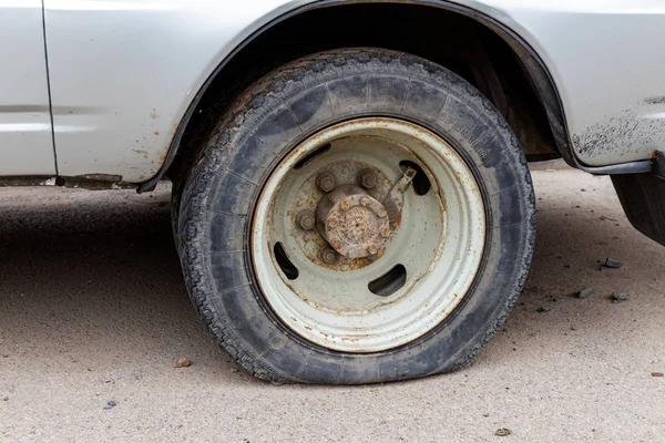 Old rusty steel auto wheel disc for car need to service repair.