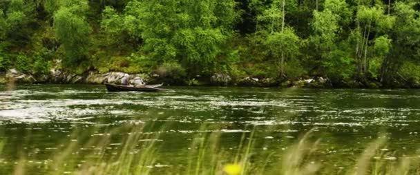 Senior men fishing from boat — Stock Video