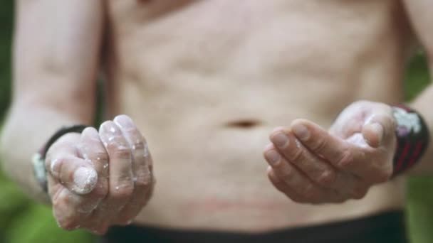 Medium Shot of a pair of Hands holding and Appying Mastc Powder — Stock video