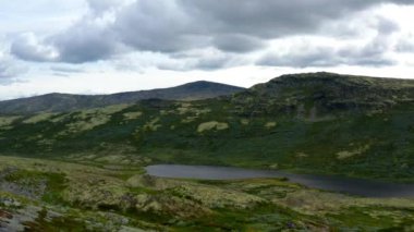 Scenic View From Above of Mountain Range and Lake in Norway