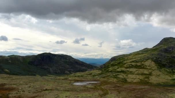 Drone Shot of the Scenic Norwegian Mountain Ranges Under Cloudy Skies — 비디오