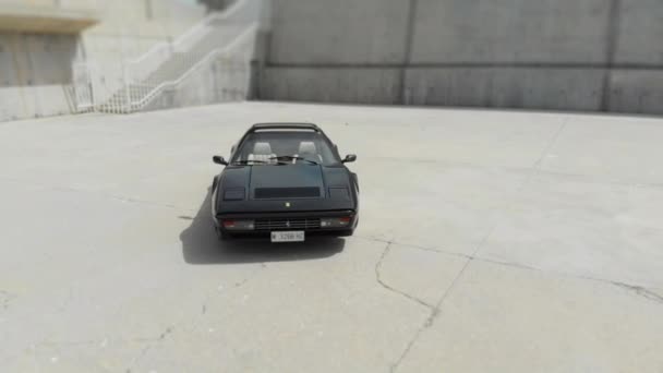 Orbiting Shot of Ferrari 1980s Sports Car Parked in Outdoors — Stock Video