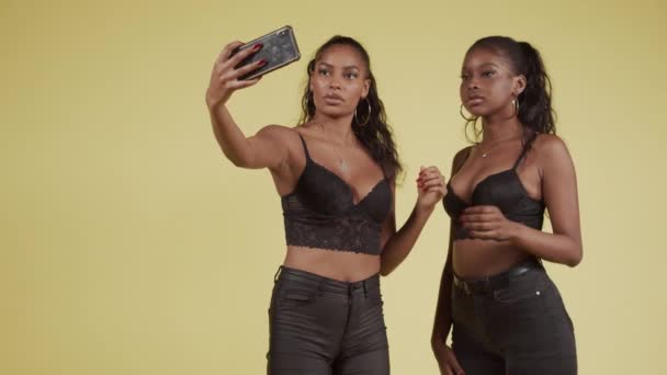 Young Black Girlfriends Posing For Smartphone Selfie — Stock Video