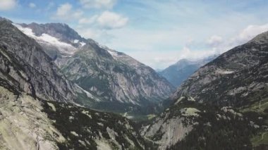Wonderful Mountain Ranges Filled with Lush Green Trees and Sky in Background