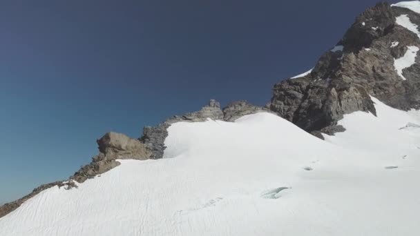 Rocky Mountain Surface Partially Covered with Snow in Switzerland — Stock videók