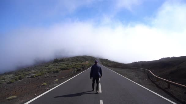 Solitary Man Walking Along Empty Road — Stock Video