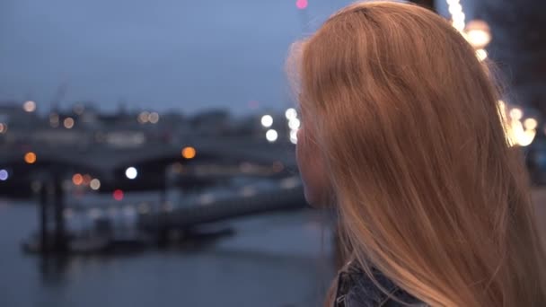 Blond Teenage Girl Looking Over Thames — Stok video