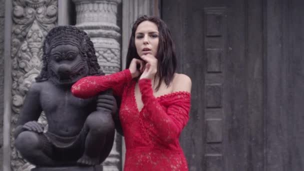 Stunning Young Woman In Red Dress At Temple — Stock Video