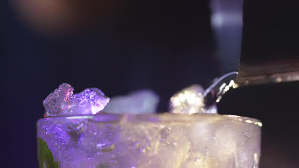 Closeup Shot of Cocktail Drink with Ice Being Filled Up — Stock Video