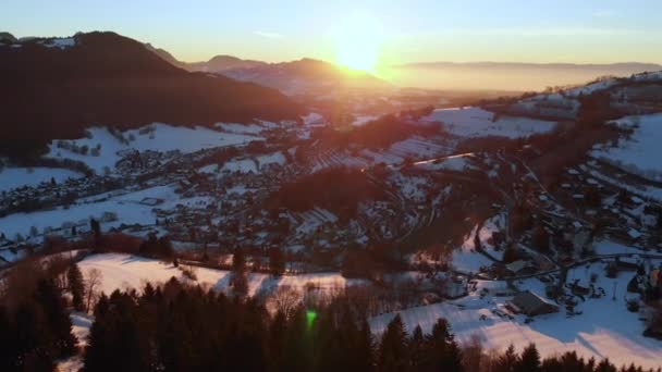 Drone Shot of the Beautiful Sunrise along the Snowy Mountains in Alps. — Vídeos de Stock