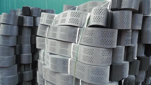 Stacks of geogrid on pallets on the stock of the plant. — Stock Video